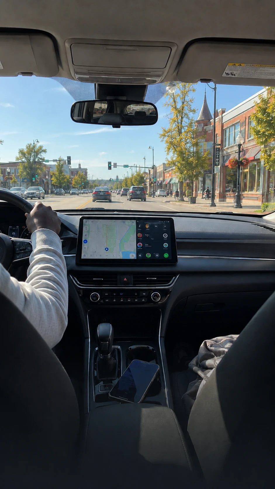 Road trip scene with shared Wi-Fi for phones, tablets, passengers, and car screens